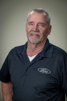 Staff member Tim Olson from ID_699533