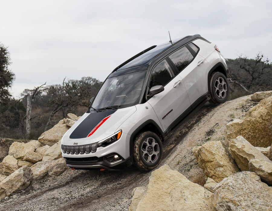 New Jeep Compass driving on rocks