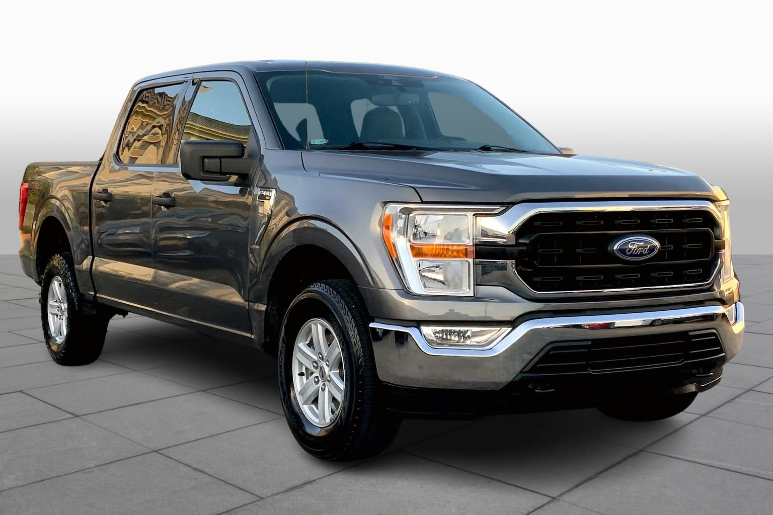 Used 2021 Ford F-150 XLT with VIN 1FTFW1E50MKD57563 for sale in Houston, TX