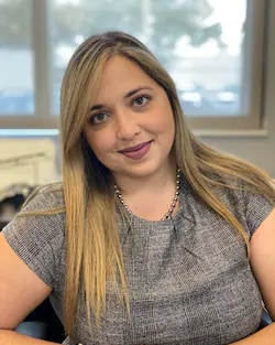 Staff member Kristal Nieves from ID_a9128e4c7a71