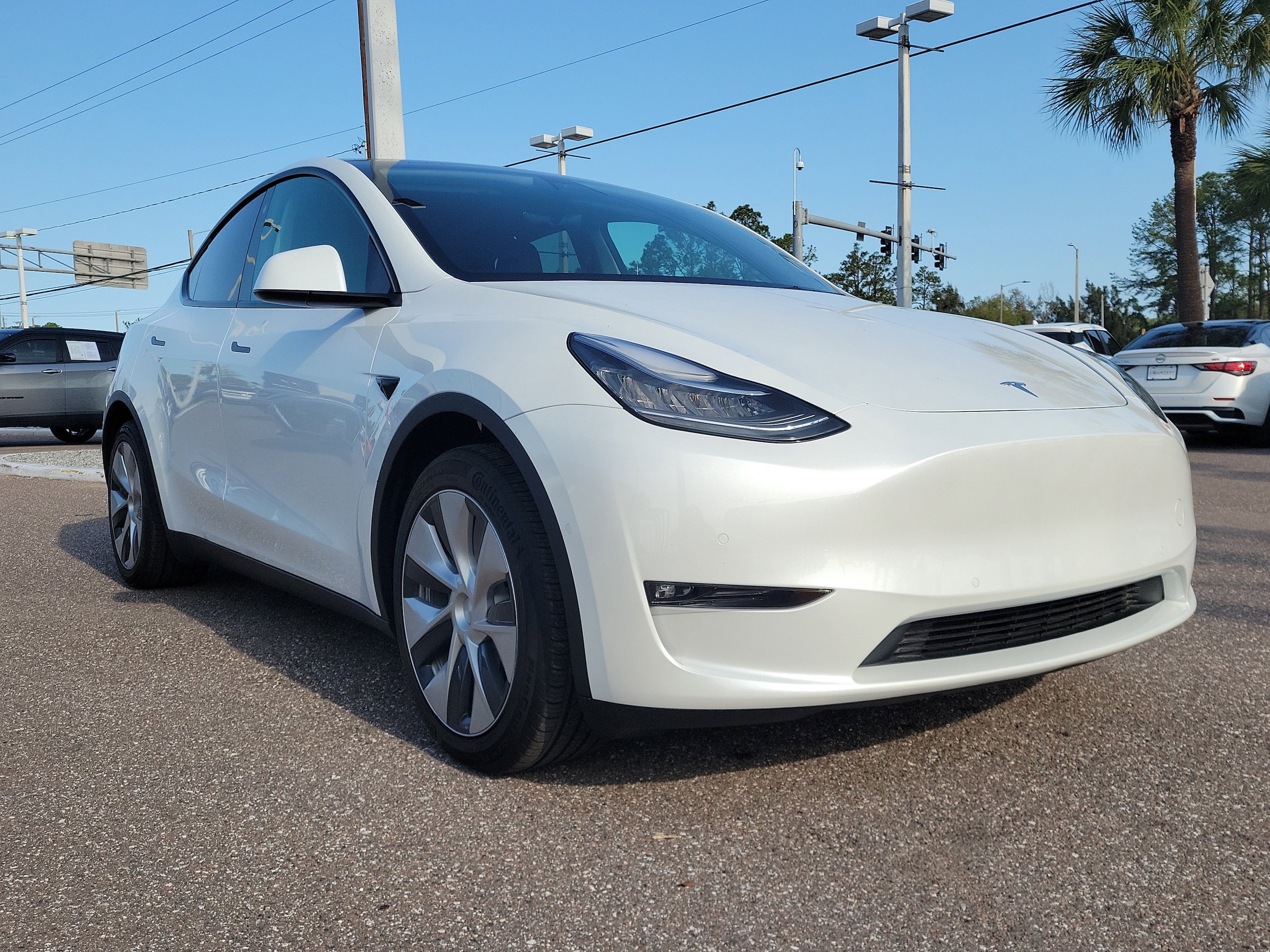 Used 2021 Tesla Model Y Long Range with VIN 5YJYGDEE9MF280907 for sale in Tampa, FL