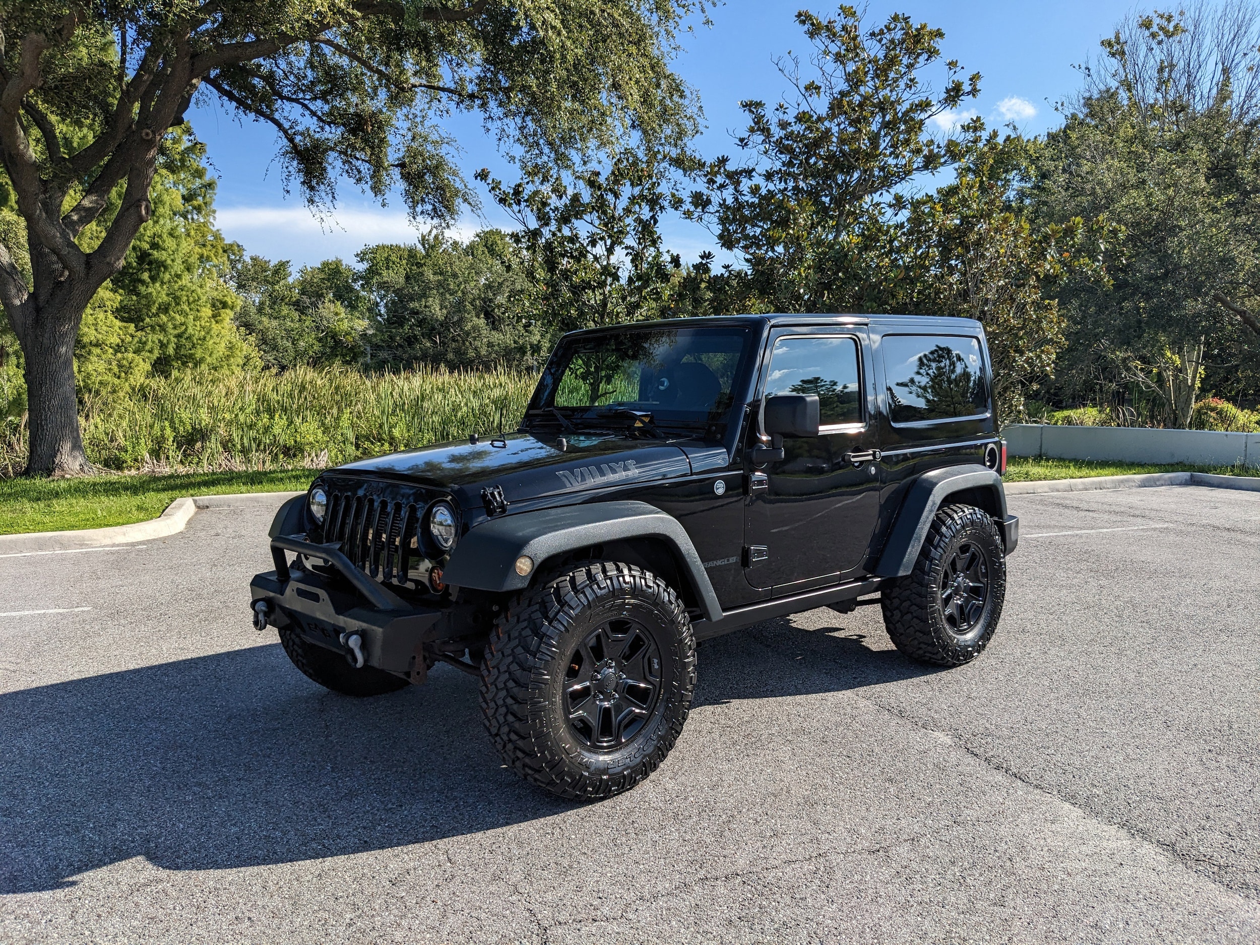 Used 2015 Jeep Wrangler Sport with VIN 1C4AJWAG5FL583933 for sale in Palm Harbor, FL