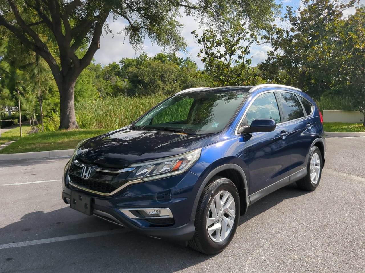 Used 2015 Honda CR-V EX-L with VIN 2HKRM3H71FH540029 for sale in Palm Harbor, FL