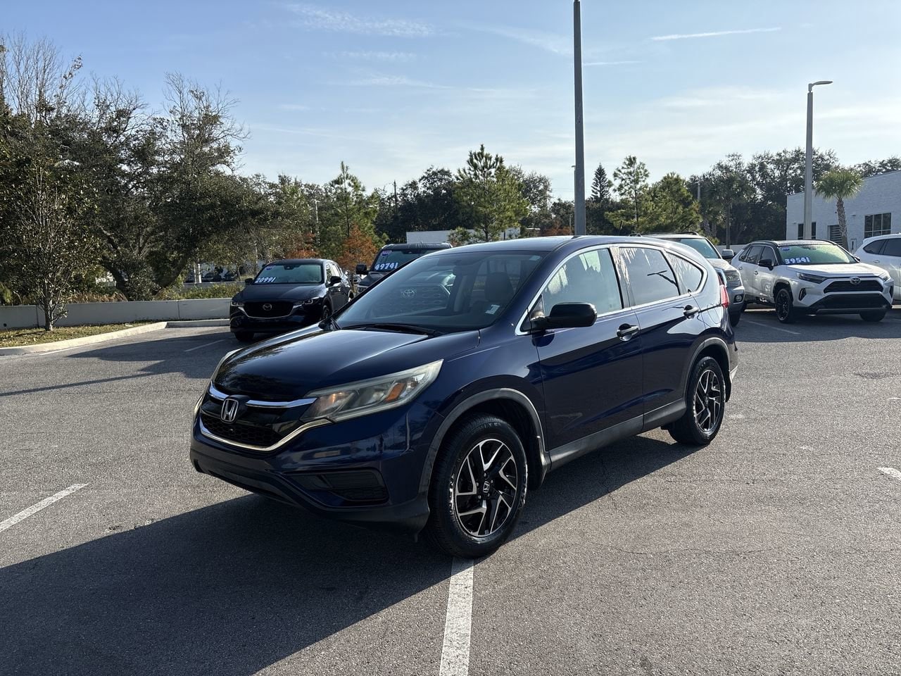 Certified 2016 Honda CR-V SE with VIN 5J6RM3H43GL030200 for sale in Palm Harbor, FL