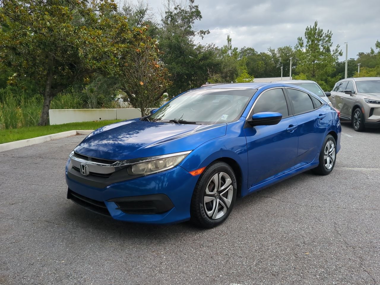 Certified 2017 Honda Civic LX with VIN 19XFC2F57HE056634 for sale in Palm Harbor, FL