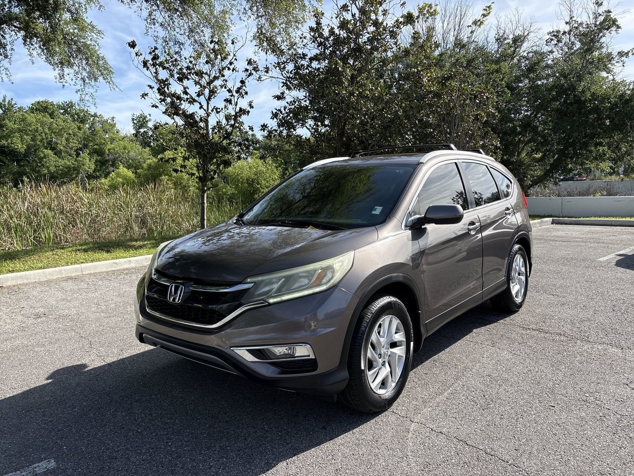 Used 2016 Honda CR-V EX-L with VIN 2HKRM3H76GH547334 for sale in Palm Harbor, FL