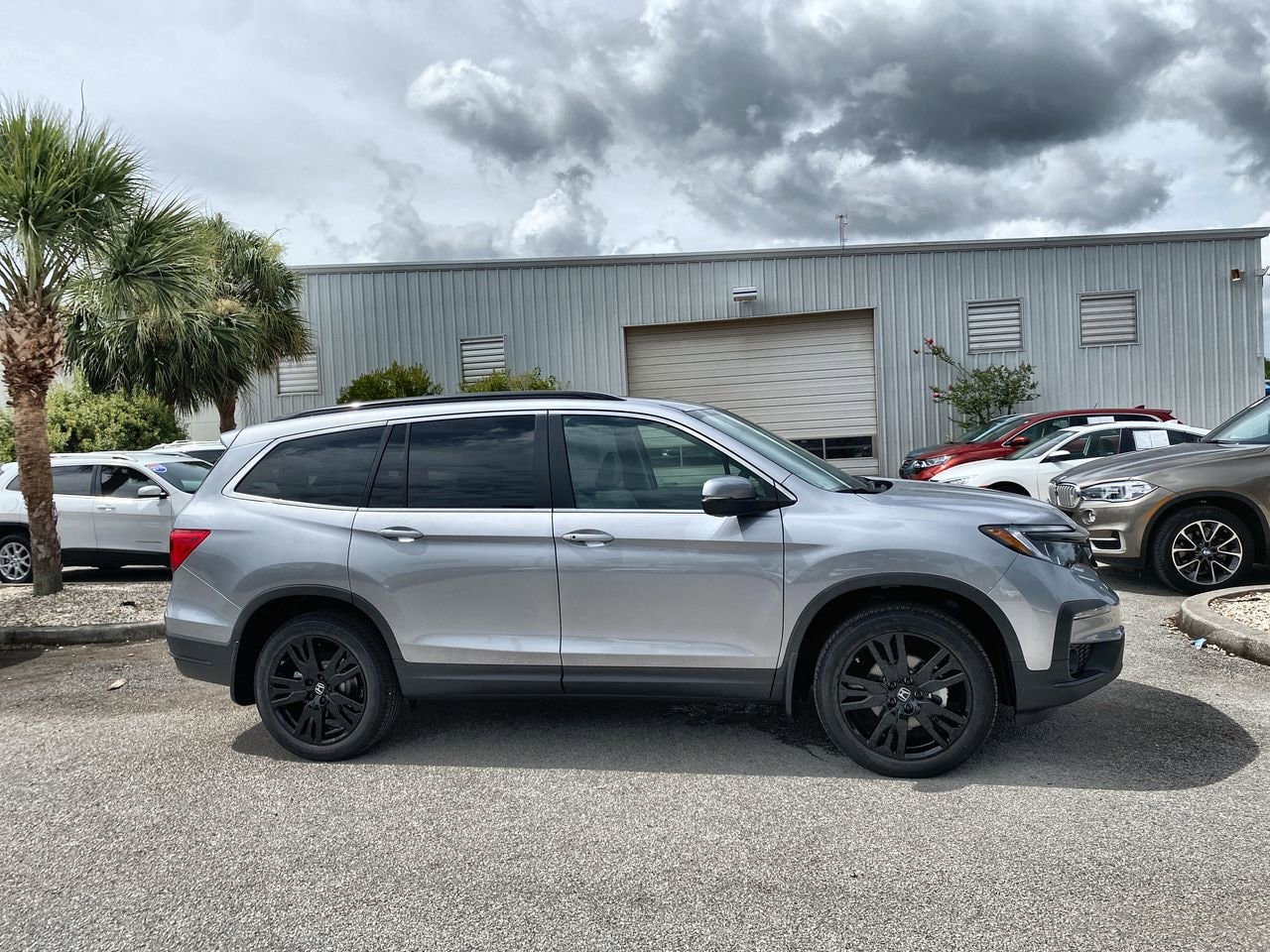 Certified 2021 Honda Pilot SE with VIN 5FNYF6H27MB091477 for sale in Palm Harbor, FL