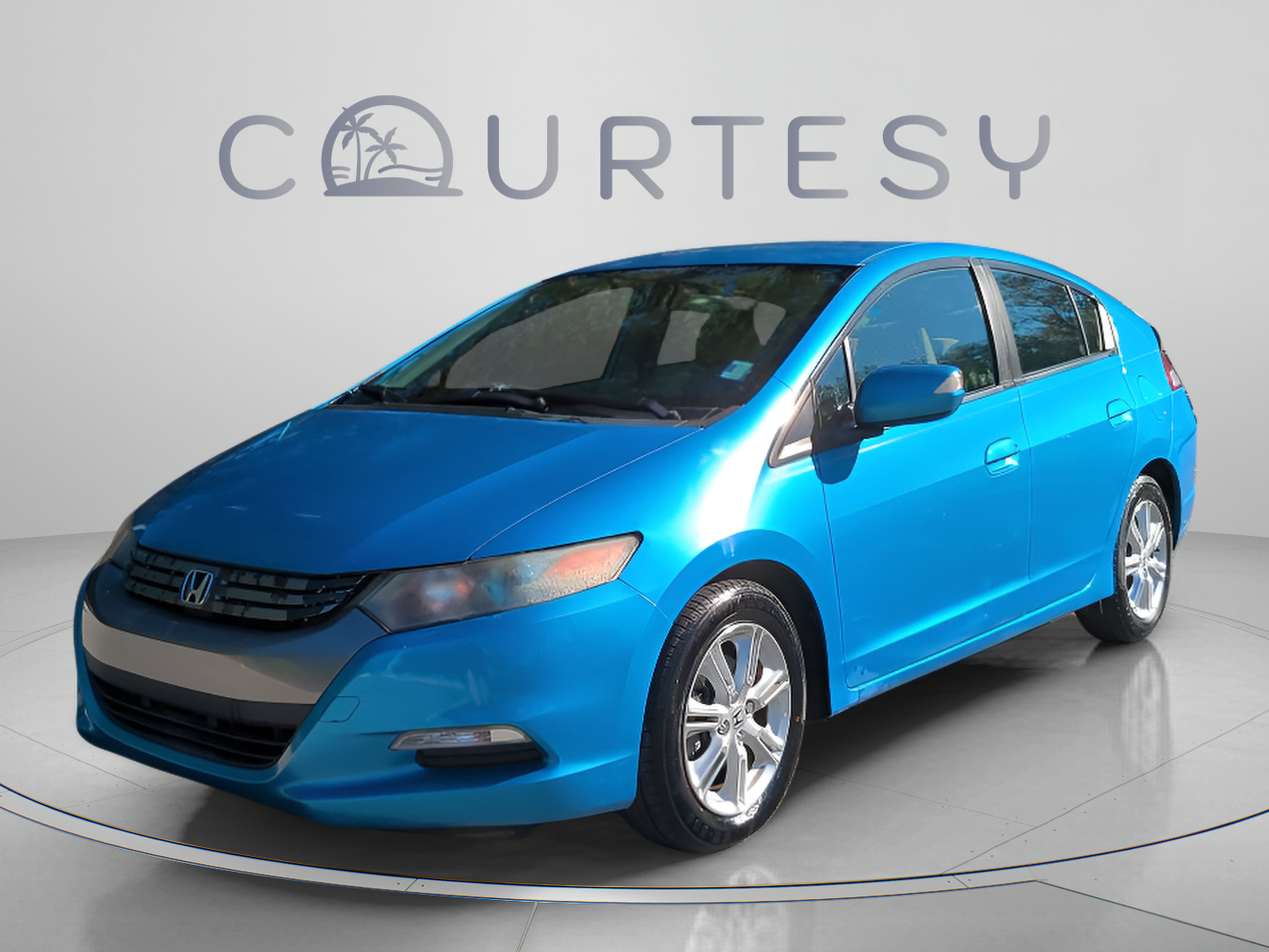 Used 2010 Honda Insight EX with VIN JHMZE2H76AS001518 for sale in Palm Harbor, FL