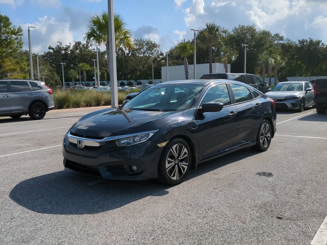 Certified 2017 Honda Civic EX-T with VIN 19XFC1F39HE026933 for sale in Palm Harbor, FL
