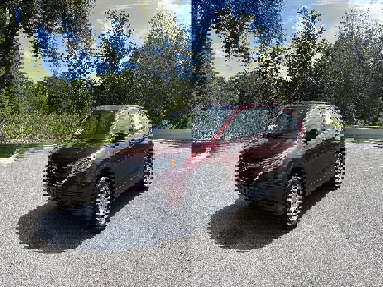 Used 2015 Honda CR-V LX with VIN 5J6RM4H31FL049274 for sale in Palm Harbor, FL