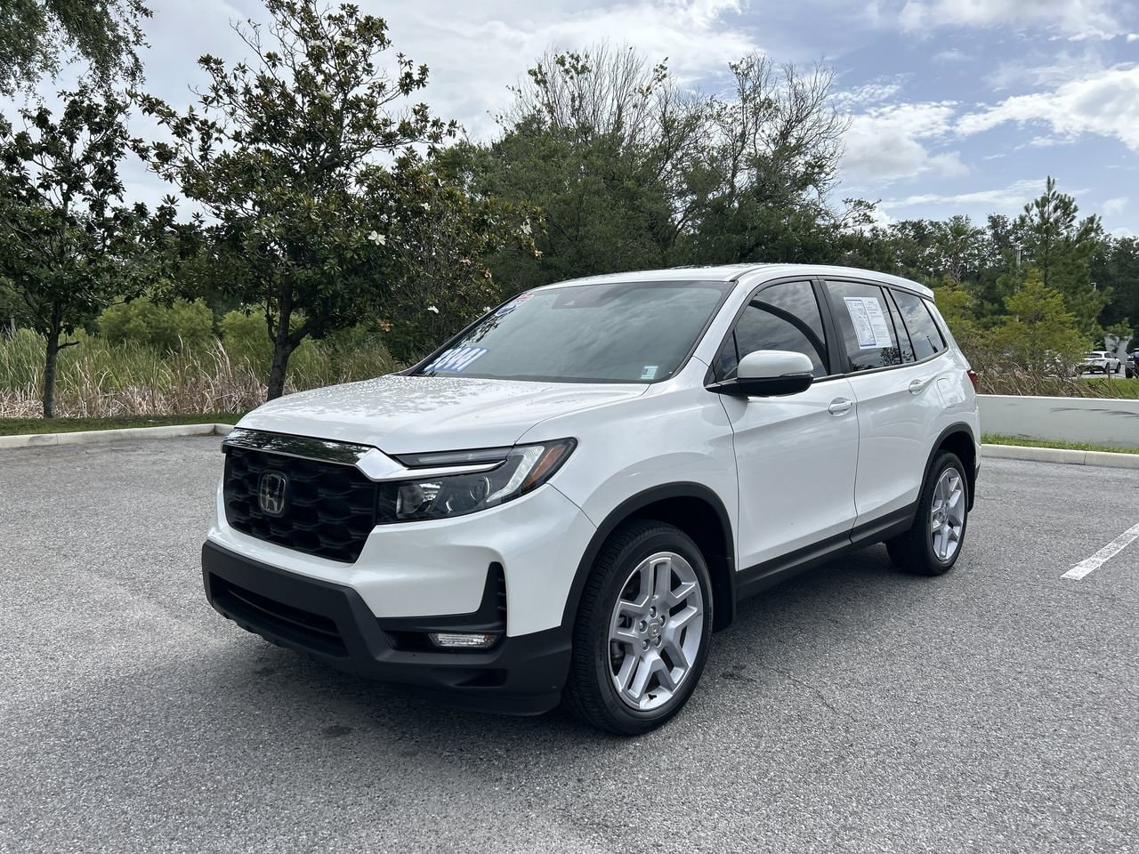 Certified 2024 Honda Passport EX-L with VIN 5FNYF8H55RB007881 for sale in Palm Harbor, FL