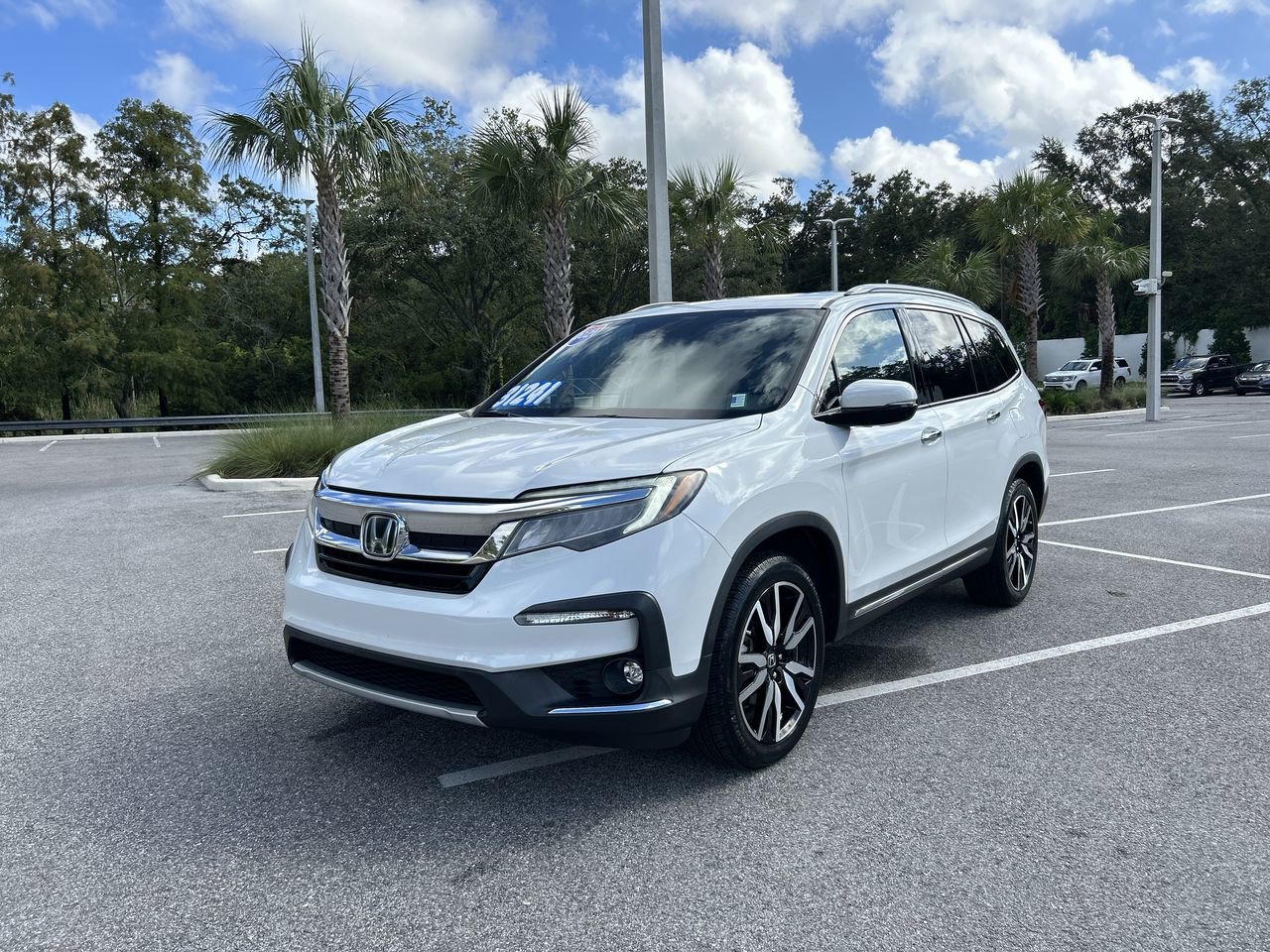 Used 2021 Honda Pilot Touring with VIN 5FNYF5H66MB007016 for sale in Palm Harbor, FL