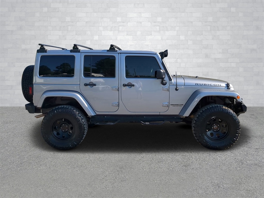 Used 2016 Jeep Wrangler Unlimited Rubicon with VIN 1C4BJWFG8GL328935 for sale in Rome, GA