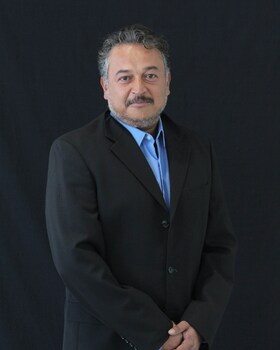 Staff member Roger Mukherjee from ID_4e00f98019f4