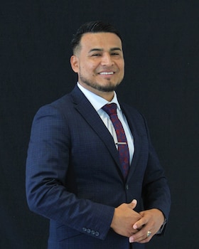 Staff member Jose Crispin from ID_4e00f98019f4