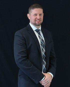 Staff member Alexander Grant from ID_912eb8c3fbb7