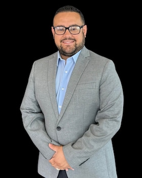 Staff member Miguel Cruz from ID_421794f19cfa