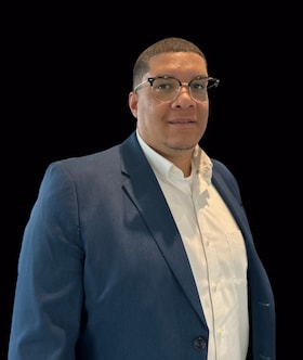 Staff member Joel Cartangena from ID_421794f19cfa