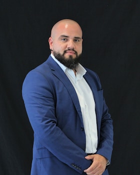 Staff member Henry Camacho from ID_4e00f98019f4