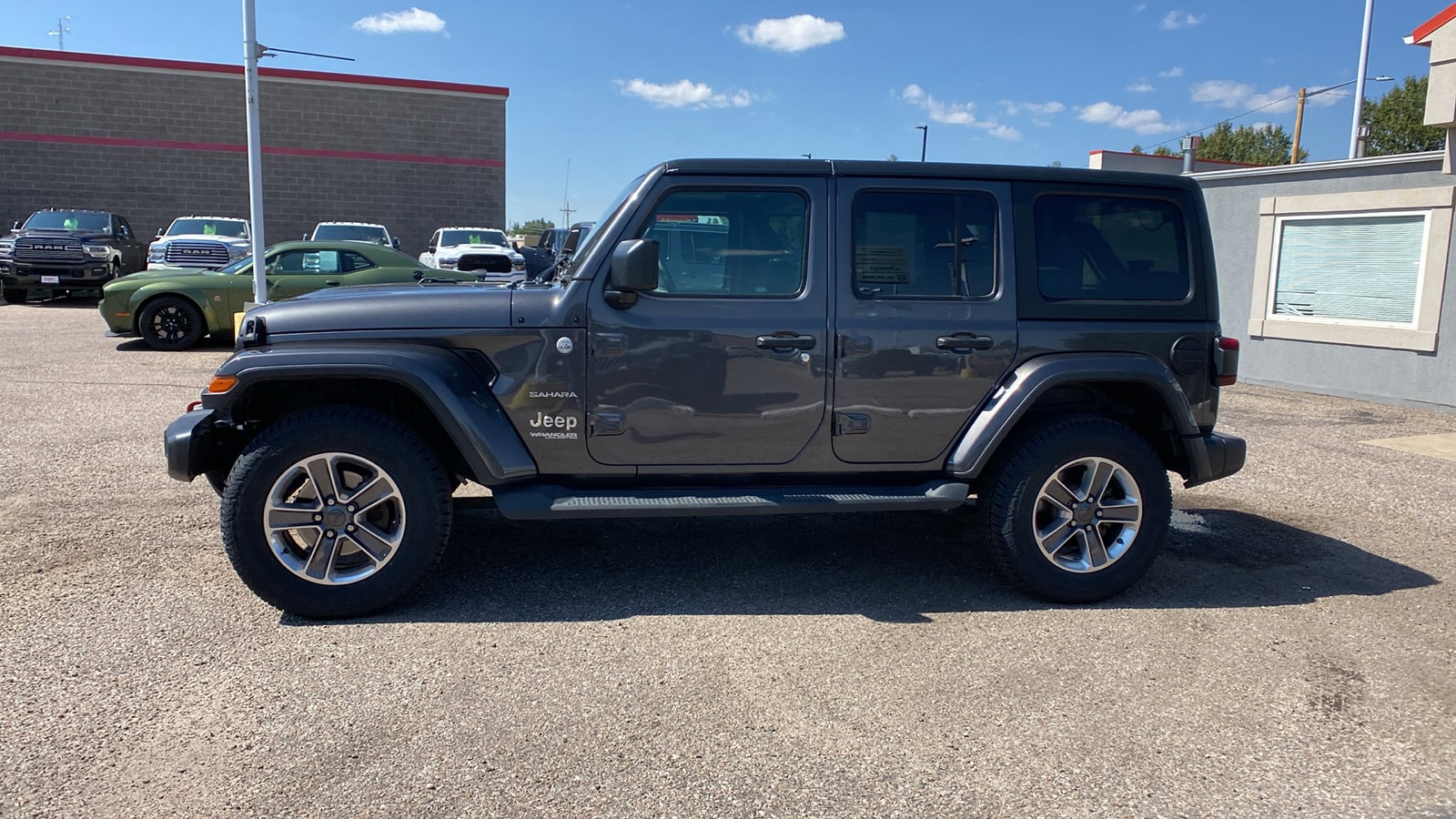 Used 2021 Jeep Wrangler Unlimited Sahara with VIN 1C4HJXEN6MW502592 for sale in Cheyenne, WY