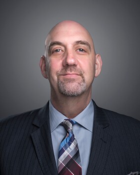 Staff member Larry Schlossberg from 599699569e0a