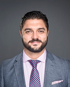 Staff member Andre Armani from 6966e50fe729