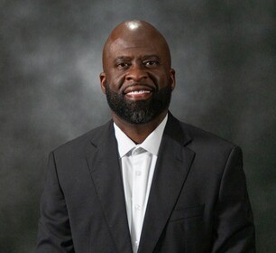 Staff member Corey Isaac from ID_55207ffa1b3b