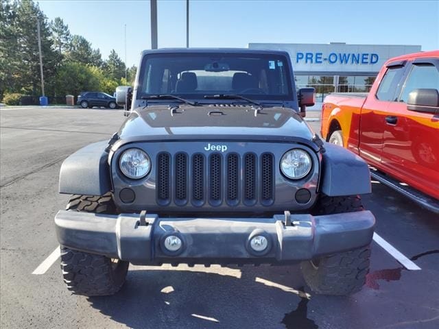 Used 2016 Jeep Wrangler Unlimited Sport S with VIN 1C4BJWDG9GL298069 for sale in Flat Rock, MI