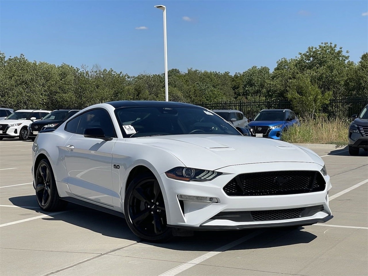 Used 2022 Ford Mustang GT Premium with VIN 1FA6P8CF9N5109223 for sale in Frisco, TX