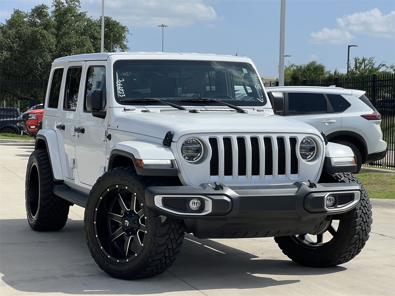 Used 2022 Jeep Wrangler Unlimited Sahara with VIN 1C4HJXEG4NW248030 for sale in Frisco, TX