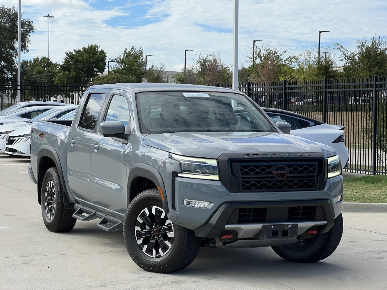 Boulder Gray Pearl 2024 Nissan Frontier Pickup Truck Four-Wheel Drive 9-Speed Automatic Overdrive