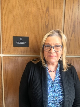 Staff member Carla Pero from ID_ab191399a104