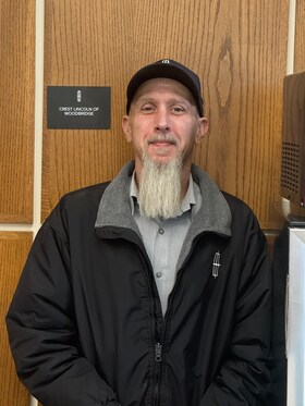 Staff member Tim Murphy from ID_ab191399a104