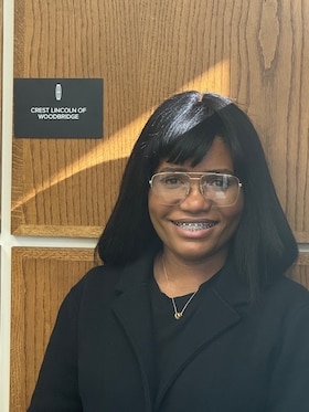 Staff member Mimi Mitima from ID_ab191399a104