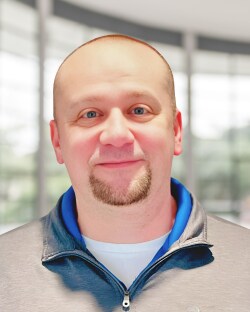 Staff member Adam Figlewicz from ID_88d79dd1a9be