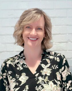 Staff member Brandi DeWitt from 231678218a2e