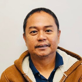 Staff member Wilberto Dangalan from ID_474c23