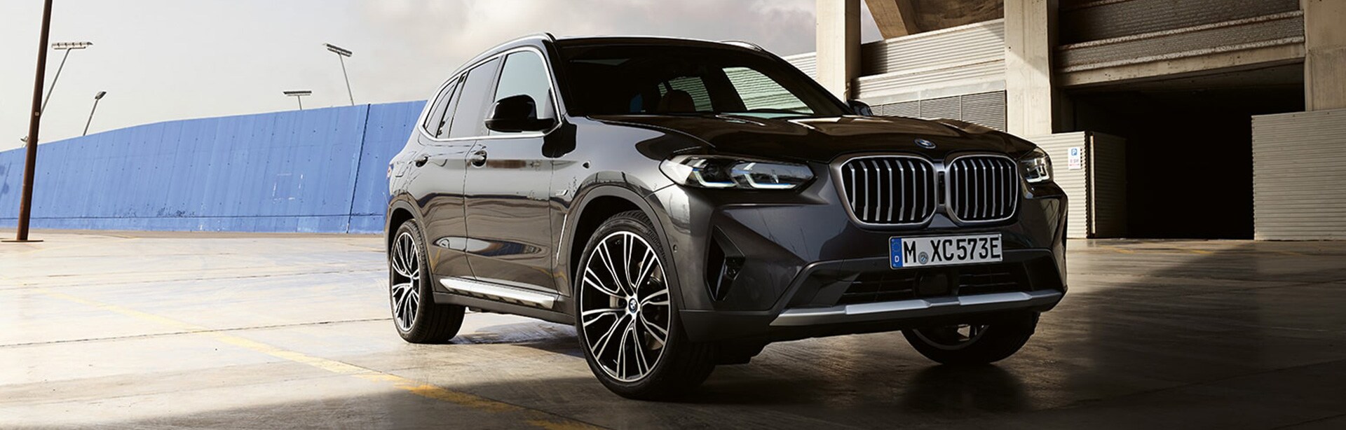 2021 BMW X3 driving on dusty road