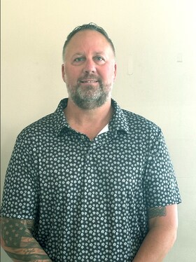 Staff member Mick Gonzales from ID_f6d2de19d9e8