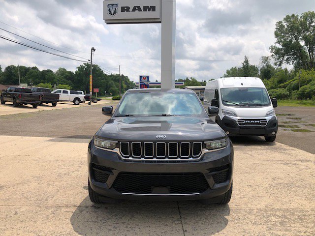 Used 2022 Jeep Grand Cherokee Laredo with VIN 1C4RJHAG7N8606810 for sale in Hudson, MI