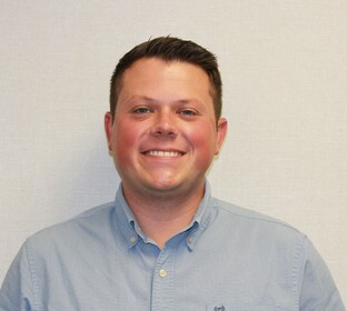 Staff member Tyler Deese from ID_f8983cb0487c