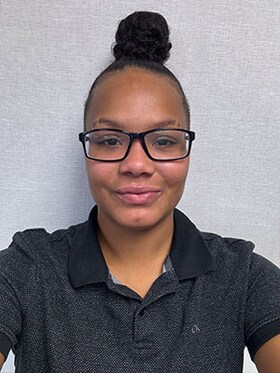 Staff member Tay Harris from ID_f8983cb0487c