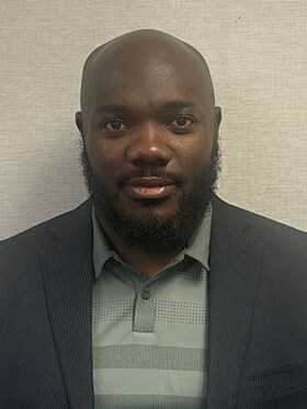 Staff member Lennox Wallace from ID_360cb1af67ec