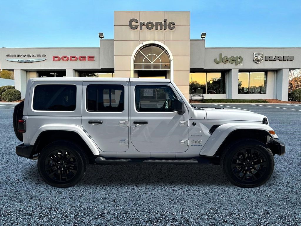 Used 2022 Jeep Wrangler Unlimited Sahara 4XE with VIN 1C4JJXP69NW227843 for sale in Griffin, GA