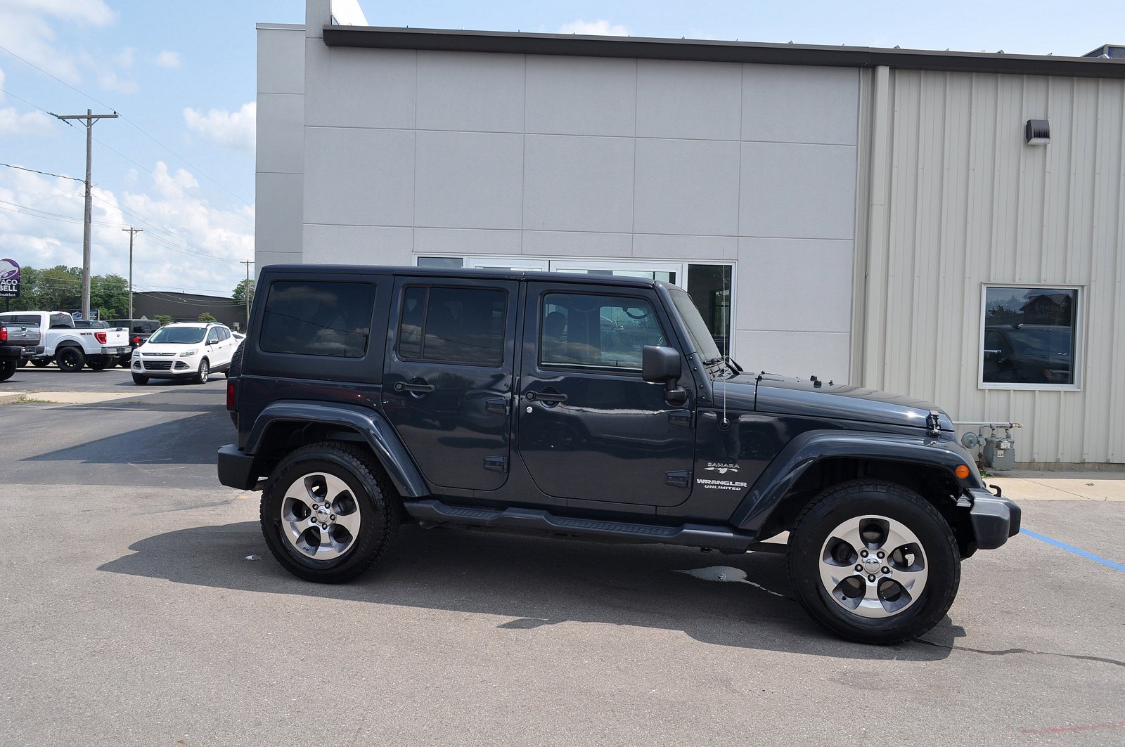 Used 2017 Jeep Wrangler Unlimited Sahara with VIN 1C4BJWEG1HL628304 for sale in Hillsdale, MI