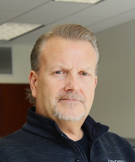 Staff member Chris REED from ID_33c51b