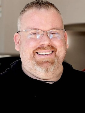 Staff member Chris Henrich from 8f034b7a32c7