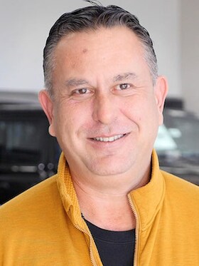 Staff member Jason Giordano from 8f034b7a32c7