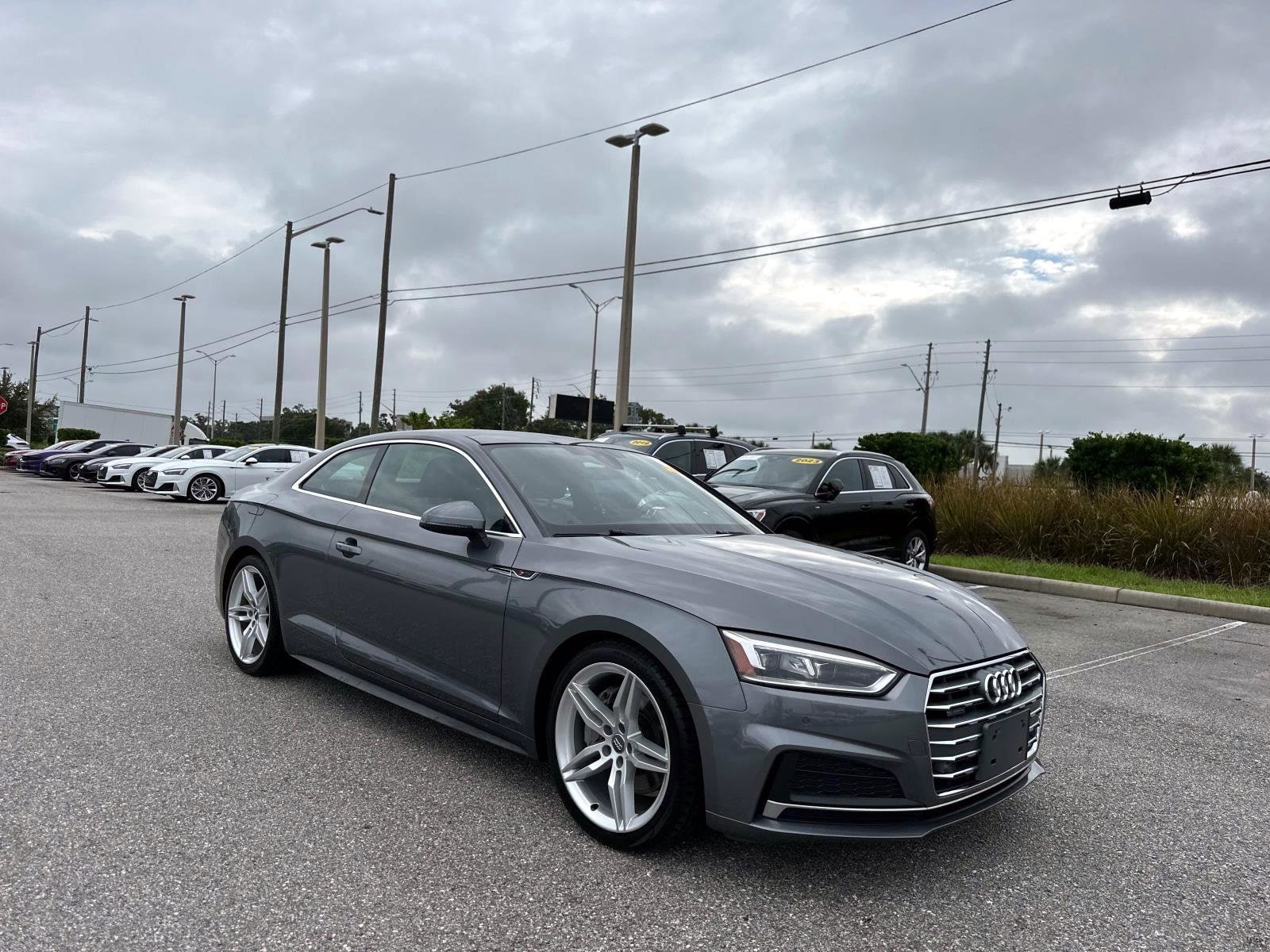 Used 2018 Audi A5 Coupe Premium Plus with VIN WAUTNAF55JA008210 for sale in Clearwater, FL