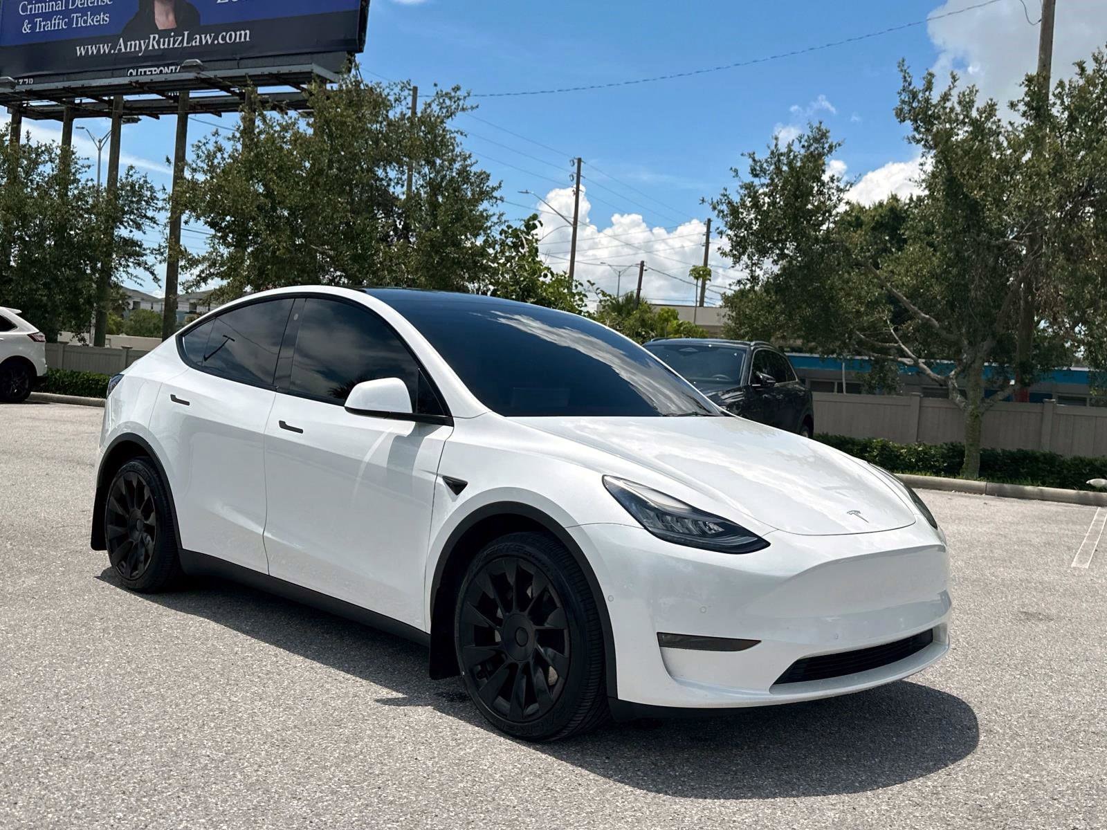 Used 2021 Tesla Model Y Long Range with VIN 5YJYGDEE2MF102515 for sale in Clearwater, FL